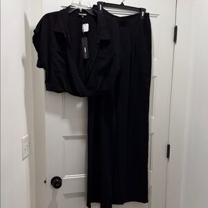 Fashion Nova Black Wide-Leg Jumpsuit with Draped Bodice. It’s an XL but fits a L